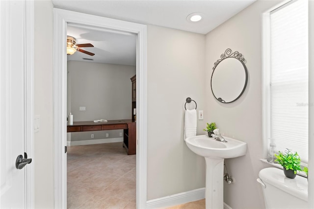 4306 Barracuda Dr, Bradenton, FL 34208 - half bath with toilet, tile patterned flooring, and baseboards