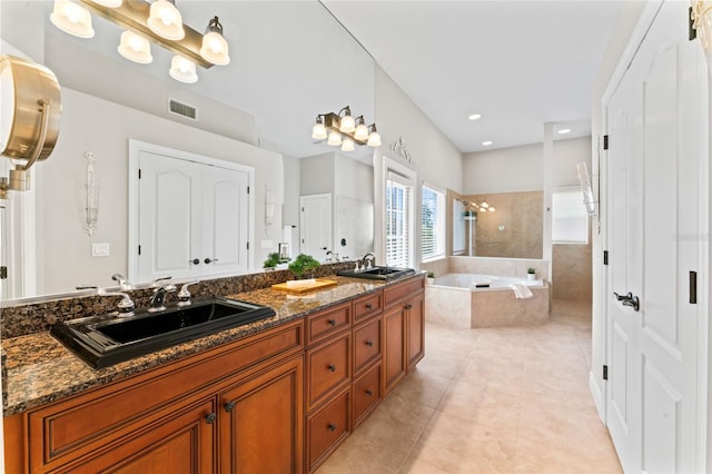 4306 Barracuda Dr, Bradenton, FL 34208 - full bathroom with a bath, double vanity, tile patterned flooring, and recessed lighting