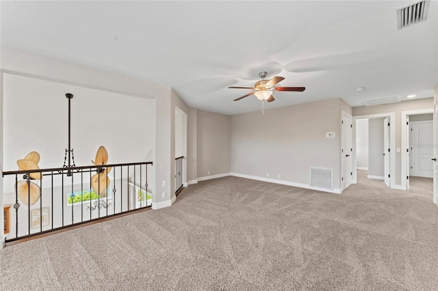 4306 Barracuda Dr, Bradenton, FL 34208 - unfurnished room with ceiling fan, carpet floors, and baseboards