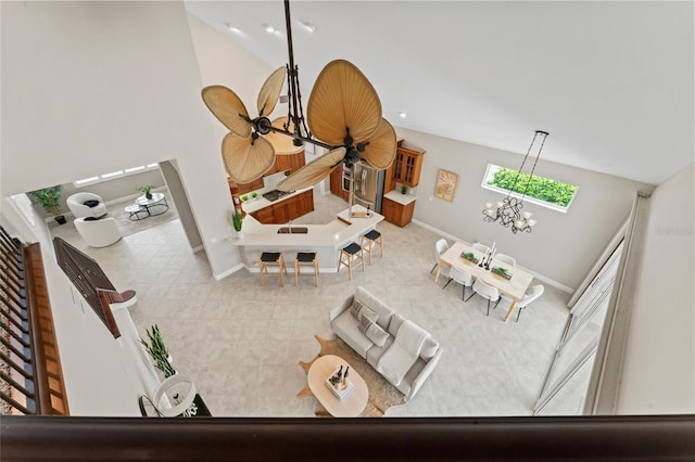 4306 Barracuda Dr, Bradenton, FL 34208 - tiled living area with baseboards and lofted ceiling
