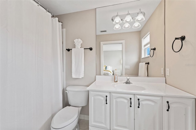 4306 Barracuda Dr, Bradenton, FL 34208 - full bathroom with vanity, toilet, and a shower with shower curtain