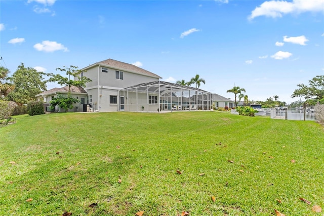4306 Barracuda Dr, Bradenton, FL 34208 - view of green lawn with glass enclosure