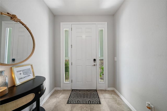 4504 Silver Lining St, Sarasota, FL 34238 - foyer entrance featuring baseboards and light tile patterned floors