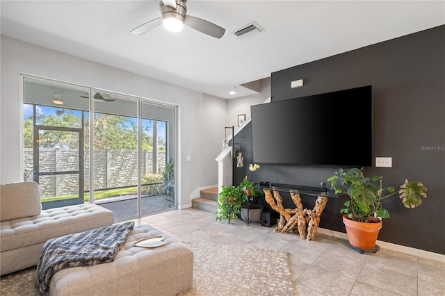 4504 Silver Lining St, Sarasota, FL 34238 - tiled living room with ceiling fan, baseboards, and stairs
