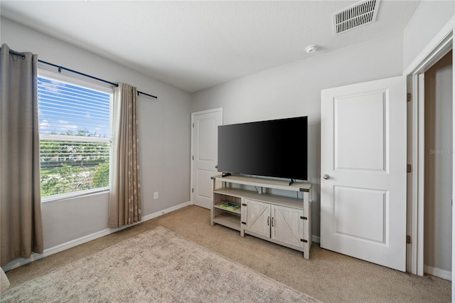 4504 Silver Lining St, Sarasota, FL 34238 - living area featuring light carpet and baseboards