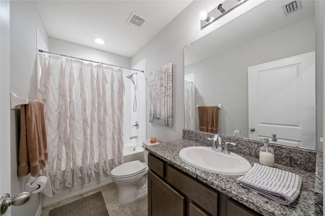 4504 Silver Lining St, Sarasota, FL 34238 - full bath featuring toilet, vanity, shower / bathtub combination with curtain, and tile patterned floors