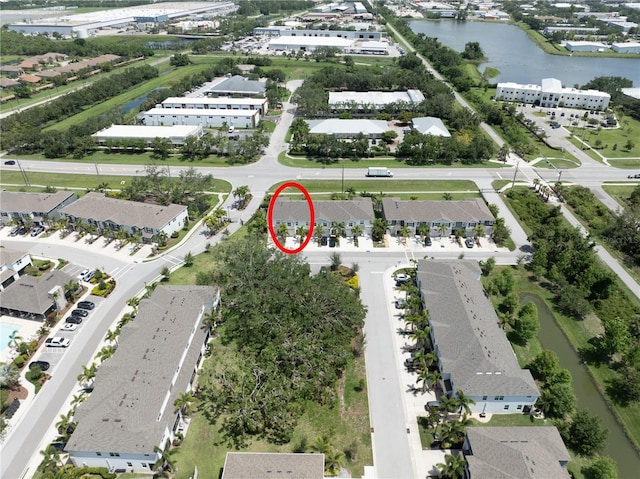 4504 Silver Lining St, Sarasota, FL 34238 - aerial overview of property's location featuring a large body of water and nearby suburban area
