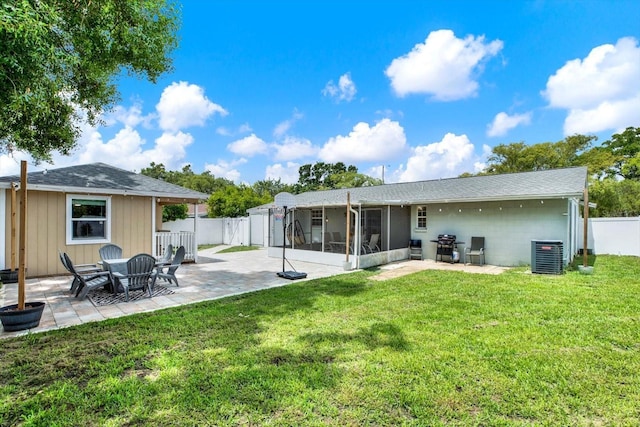 801 Kirkcaldy Way, Valrico, FL 33594 - back of property featuring a sunroom, cooling unit, a patio, roof with shingles, and concrete block siding