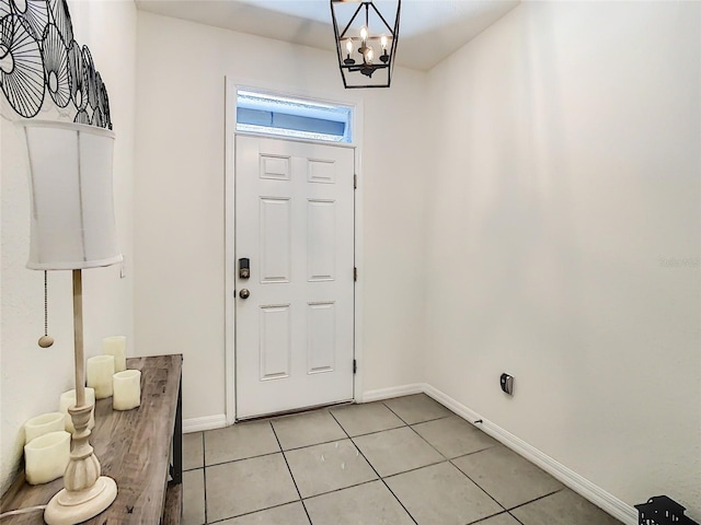 32977 Kaloko Rd, Wesley Chapel, FL 33543 - entrance foyer featuring a chandelier and light tile patterned flooring
