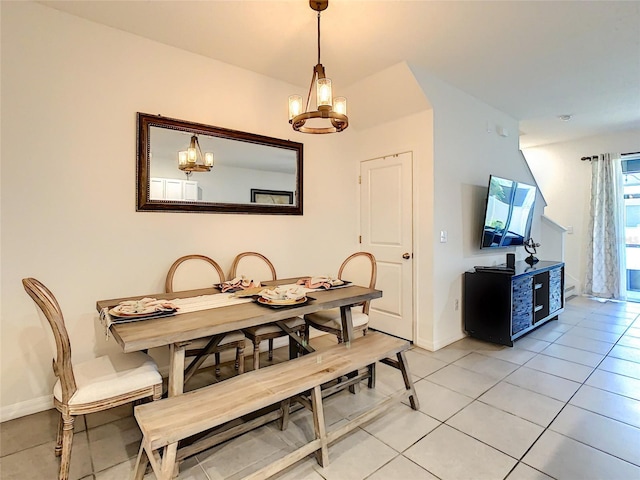 32977 Kaloko Rd, Wesley Chapel, FL 33543 - dining room featuring a chandelier and light tile patterned floors