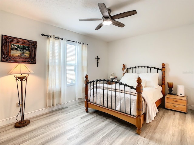 32977 Kaloko Rd, Wesley Chapel, FL 33543 - bedroom featuring wood finished floors and ceiling fan