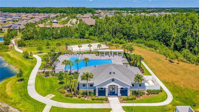 32977 Kaloko Rd, Wesley Chapel, FL 33543 - drone / aerial view of a pool area and a nearby body of water