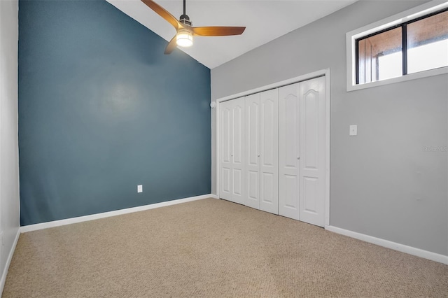 1038 E Michigan St Unit B, Orlando, FL 32806 - unfurnished bedroom with carpet flooring, baseboards, and vaulted ceiling