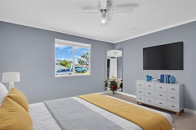1415 Yale Dr, Holiday, FL 34691 - bedroom featuring baseboards and ceiling fan