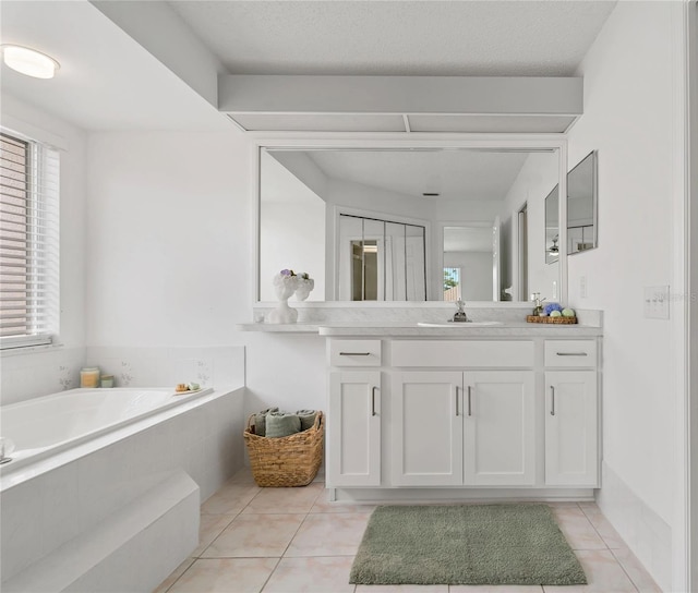 11411 Terrell, Spring Hill, FL 34606 - bathroom with vanity, a garden tub, and tile patterned floors