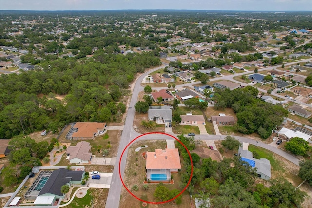 11411 Terrell, Spring Hill, FL 34606 - aerial view of property and surrounding area with nearby suburban area
