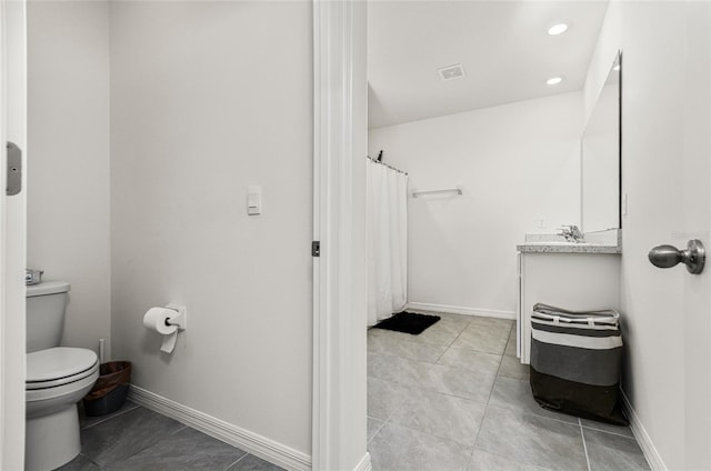 33668 Elm Hill Br, Wesley Chapel, FL 33545 - bathroom with vanity, tile patterned flooring, and recessed lighting