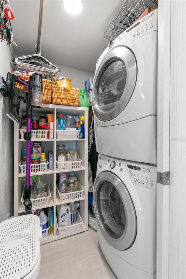 433 S Paula Dr Unit 31, Dunedin, FL 34698 - laundry room with stacked washer / dryer
