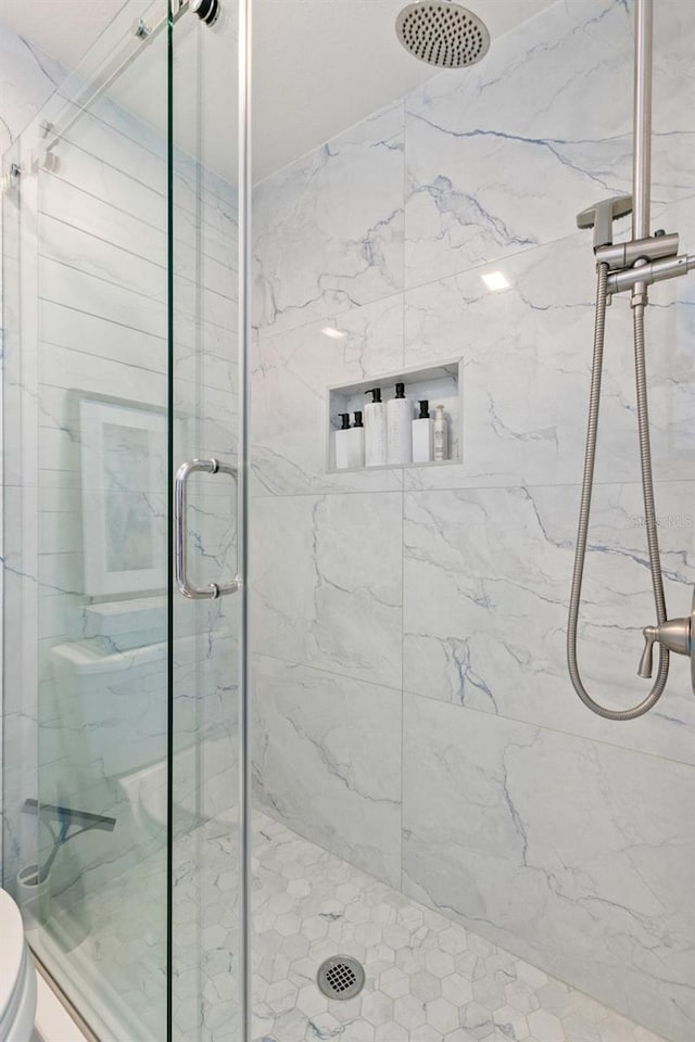 433 S Paula Dr Unit 31, Dunedin, FL 34698 - bathroom with a marble finish shower and toilet