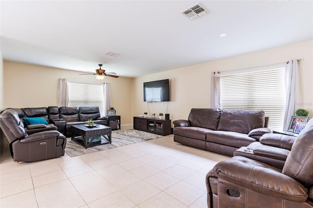 12624 White Bluff Rd, Hudson, FL 34669 - living area featuring ceiling fan and light tile patterned floors