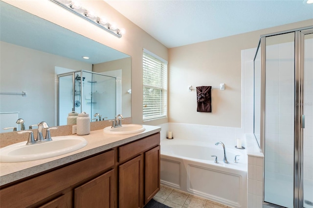 12624 White Bluff Rd, Hudson, FL 34669 - full bath with a bath, a shower stall, double vanity, and tile patterned flooring