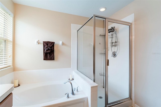 12624 White Bluff Rd, Hudson, FL 34669 - full bath with a bath, a stall shower, and vanity