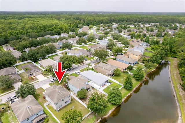 12624 White Bluff Rd, Hudson, FL 34669 - aerial view of residential area with a large body of water and a forest