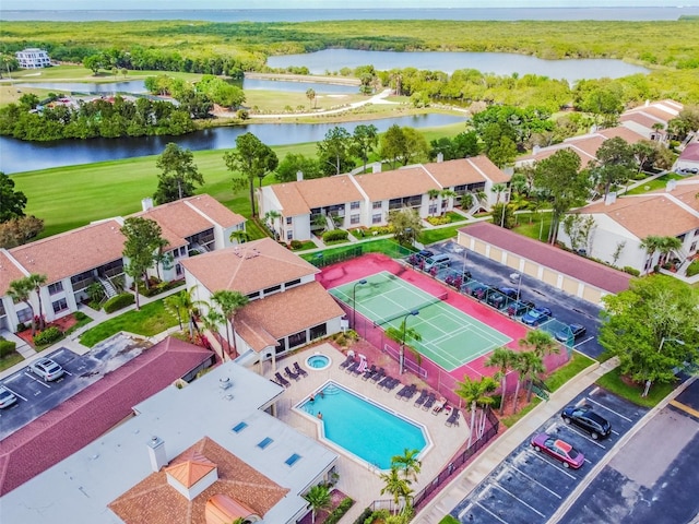 1967 Cormorant Ct Unit 515, Clearwater, FL 33762 - drone / aerial view of a large body of water, a pool, and a golf course