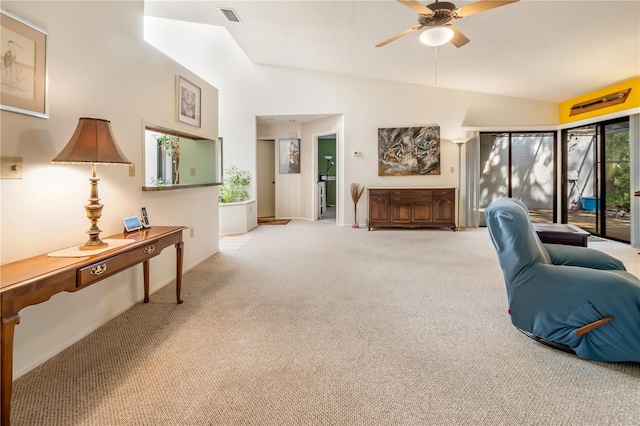 70 Morning Dove Pl, Oldsmar, FL 34677 - carpeted living room with vaulted ceiling and ceiling fan