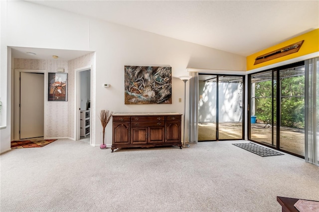 70 Morning Dove Pl, Oldsmar, FL 34677 - living area with lofted ceiling and light colored carpet