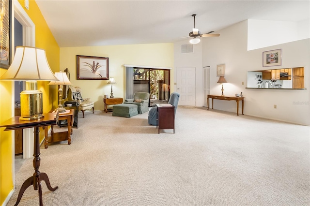70 Morning Dove Pl, Oldsmar, FL 34677 - living room featuring carpet flooring, a ceiling fan, and high vaulted ceiling