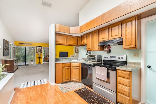 70 Morning Dove Pl, Oldsmar, FL 34677 - kitchen featuring stainless steel electric range oven, black dishwasher, under cabinet range hood, light countertops, and open floor plan