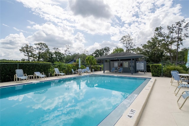 70 Morning Dove Pl, Oldsmar, FL 34677 - community pool featuring a patio