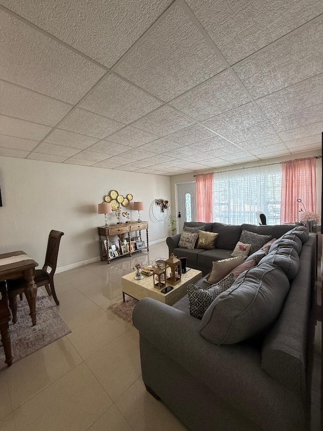 5860 43rd Ter N Unit 1518, Kenneth City, FL 33709 - tiled living room with baseboards and a drop ceiling