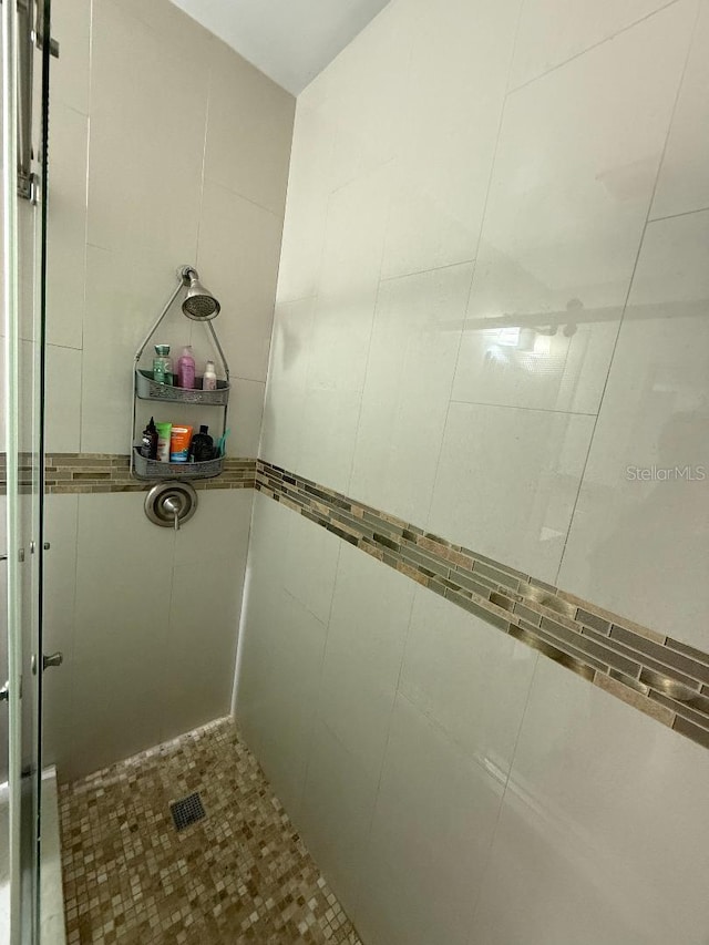 5860 43rd Ter N Unit 1518, Kenneth City, FL 33709 - bathroom with a stall shower
