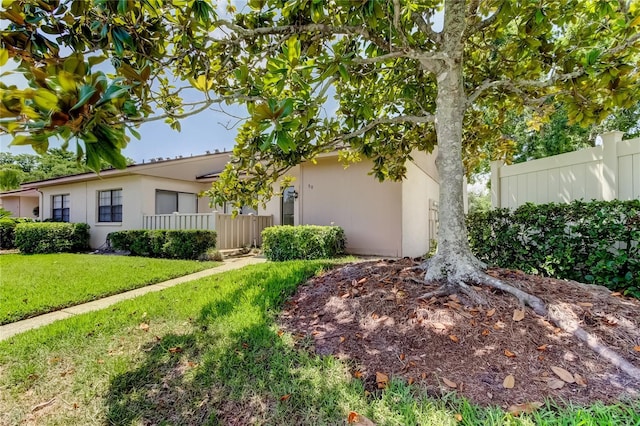 50 Ingrid Pl Unit 50, Oldsmar, FL 34677 - view of property exterior with stucco siding