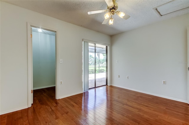 50 Ingrid Pl Unit 50, Oldsmar, FL 34677 - empty room with hardwood / wood-style flooring, a textured ceiling, ceiling fan, and baseboards