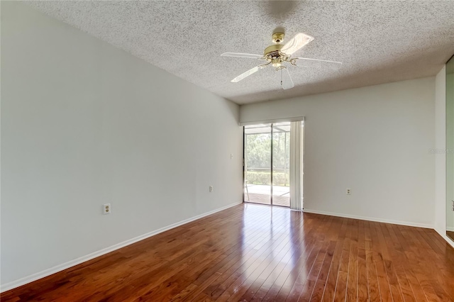 50 Ingrid Pl Unit 50, Oldsmar, FL 34677 - unfurnished room with a textured ceiling, wood-type flooring, baseboards, and ceiling fan