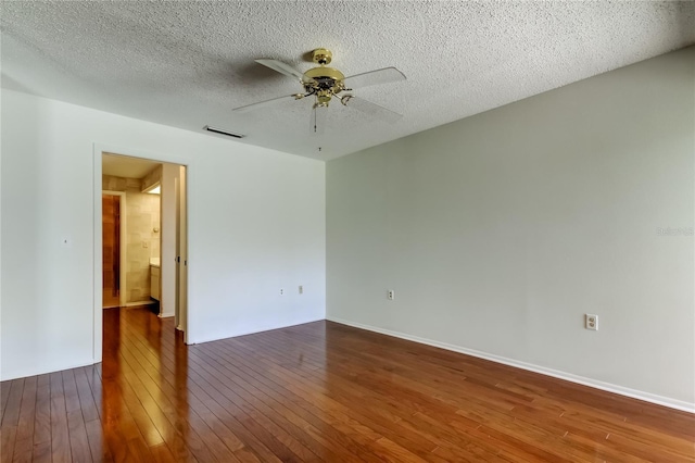 50 Ingrid Pl Unit 50, Oldsmar, FL 34677 - unfurnished room featuring hardwood / wood-style floors, ceiling fan, and a textured ceiling