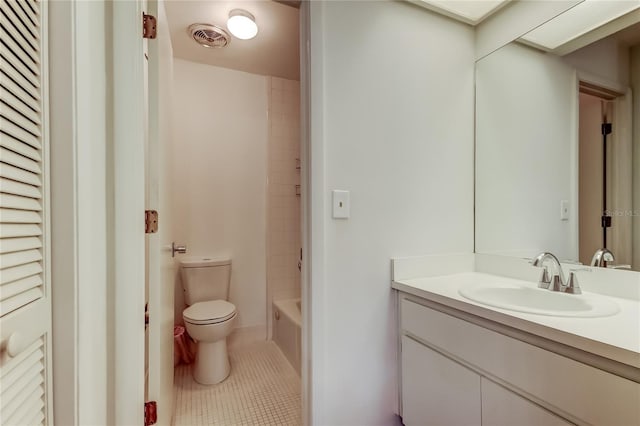 50 Ingrid Pl Unit 50, Oldsmar, FL 34677 - full bath featuring vanity, tile patterned flooring, toilet, and shower / washtub combination