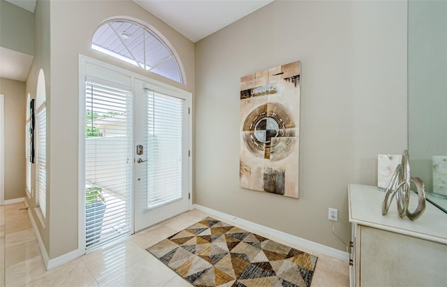 1710 Lago Vista Blvd, Palm Harbor, FL 34685 - entryway with healthy amount of natural light and light tile patterned flooring