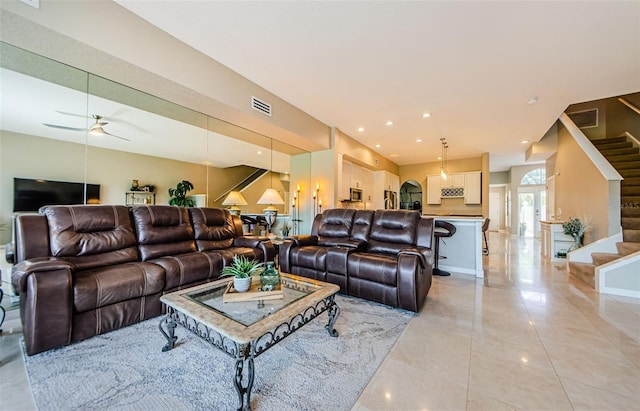 1710 Lago Vista Blvd, Palm Harbor, FL 34685 - living area with stairway, a ceiling fan, and recessed lighting