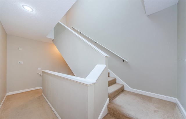 1710 Lago Vista Blvd, Palm Harbor, FL 34685 - staircase featuring carpet flooring and recessed lighting