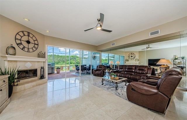 1710 Lago Vista Blvd, Palm Harbor, FL 34685 - living area with a ceiling fan, a fireplace, and recessed lighting