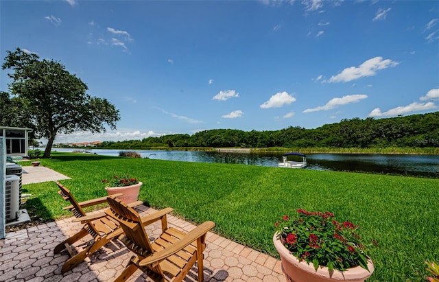 1710 Lago Vista Blvd, Palm Harbor, FL 34685 - view of patio / terrace with a water view