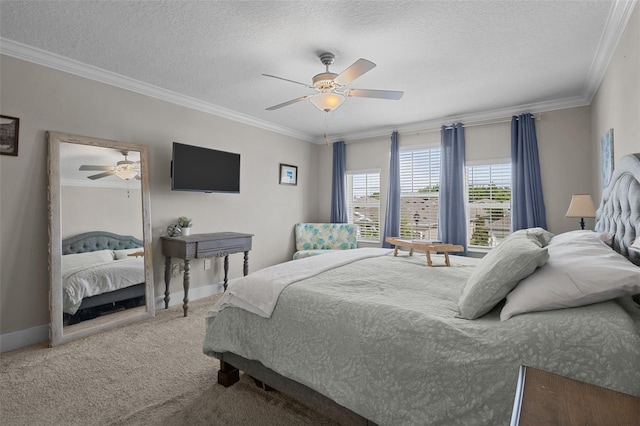 4077 Cadence Loop, Land O Lakes, FL 34638 - bedroom with carpet flooring, crown molding, a textured ceiling, baseboards, and a ceiling fan