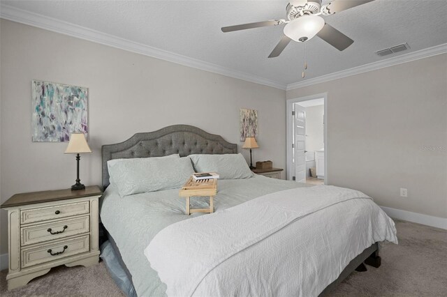 4077 Cadence Loop, Land O Lakes, FL 34638 - bedroom with carpet flooring, ornamental molding, baseboards, ceiling fan, and ensuite bath