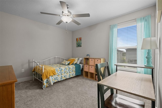 4077 Cadence Loop, Land O Lakes, FL 34638 - carpeted bedroom with ceiling fan, an office area, and baseboards