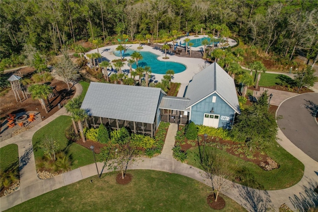 4077 Cadence Loop, Land O Lakes, FL 34638 - bird's eye view of a pool area and a forest