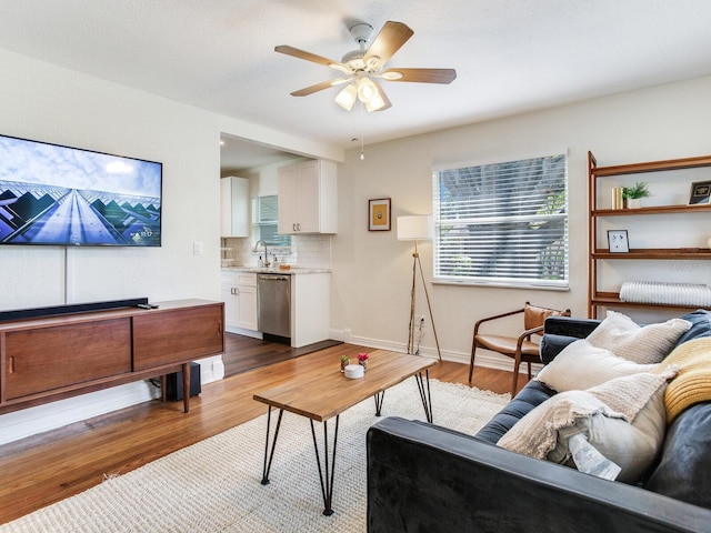 1243 55th Ave N, Saint Petersburg, FL 33703 - living room with ceiling fan and wood finished floors